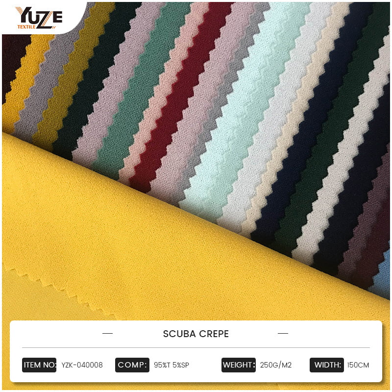 Jak inženýrství vláken s vysokým zákrutem definuje charakteristické hmatové a strukturální vlastnosti mechové krepové tkaniny?